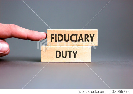 Fiduciary duty words symbol. Concept words Fiduciary duty on beautiful wooden blocks. Beautiful grey background. Businessman hand. Business and Fiduciary duty words concept. Copy space. Fiduciary duty words symbol. Concept words Fiduciary duty on beautiful wooden blocks. Beautiful grey background. Businessman hand. Business and Fiduciary duty words concept. Copy space. 138966754