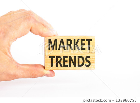 Market trends words symbol. Concept words Market trends on beautiful wooden blocks. Beautiful white background. Businessman hand. Business and Market trends words concept. Copy space. Market trends words symbol. Concept words Market trends on beautiful wooden blocks. Beautiful white background. Businessman hand. Business and Market trends words concept. Copy space. 138966755