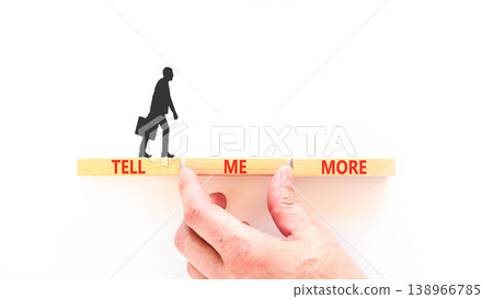 Tell me more words symbol. Concept words Tell me more on beautiful wooden blocks. Beautiful white background. Businessman hand. Business and tell me more concept. Copy space. Tell me more words symbol. Concept words Tell me more on beautiful wooden blocks. Beautiful white background. Businessman hand. Business and tell me more concept. Copy space. 138966785