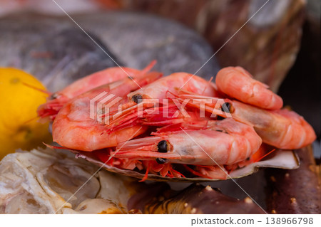 Red raw prawns on counter at food market - close up Red raw prawns on counter at food market - close up 138966798