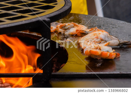 Process of grilling red prawns on brazier with hot flame - close up 138966802