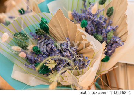 Close up: beautiful bouquets of purple lavender flowers in craft paper cornets Close up: beautiful bouquets of purple lavender flowers in craft paper cornets 138966805