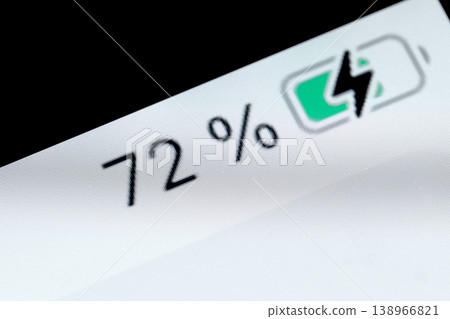 Smartphone charged battery level indicator - 72 percent: close up macro 138966821