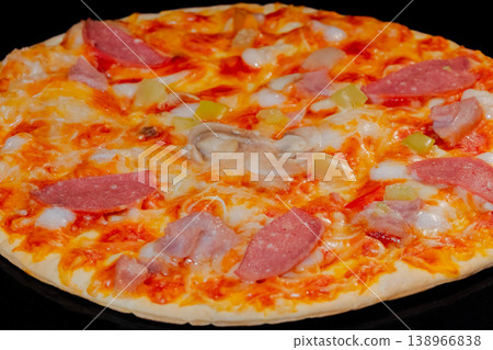 Homemade pizza baking on tray in electric oven: close up Homemade pizza baking on tray in electric oven: close up 138966838