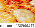 Baked homemade pizza Margherita in electric oven at home: close up 138966843