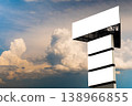 Four blank white billboards against warm sunset sky with clouds - mock up 138966855
