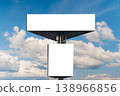 Mock up - two blank white billboards against sky with white clouds - front view 138966856