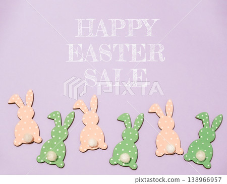 Group of Easter rabbits are on a purple background with the words 138966957