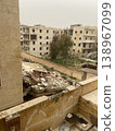 Damaged buildings and rubble scene, ideal for war reports 138967099