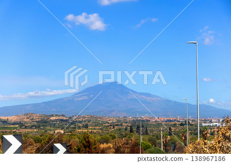 Majestic Etna volcano with sunny sky and natural landscape. 138967186