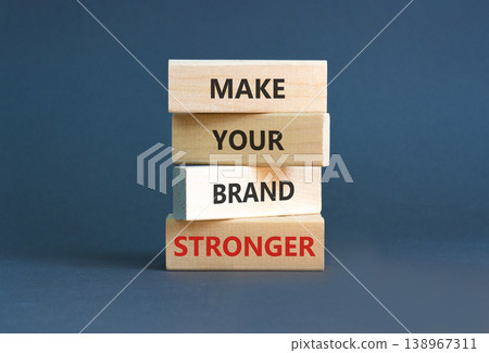 Make your brand stronger words symbol. Concept words Make your brand stronger on beautiful wooden blocks. Beautiful grey background. Business make your brand stronger concept. Copy space. Make your brand stronger words symbol. Concept words Make your brand stronger on beautiful wooden blocks. Beautiful grey background. Business make your brand stronger concept. Copy space. 138967311