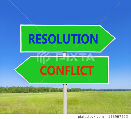 Resolution and conflict symbol. Concept words Resolution and Conflict on beautiful green road sign. Beautiful blue sky green grass background. Social resolution instead conflict concept. Copy space. Resolution and conflict symbol. Concept words Resolution and Conflict on beautiful green road sign. Beautiful blue sky green grass background. Social resolution instead conflict concept. Copy space. 138967323