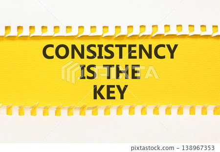 Consistency is the key symbol. Concept words Consistency is the key on beautiful yellow paper. Beautiful white paper background. Business consistency is the key concept. Copy space. Consistency is the key symbol. Concept words Consistency is the key on beautiful yellow paper. Beautiful white paper background. Business consistency is the key concept. Copy space. 138967353