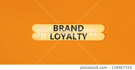Brand loyalty words symbol. Concept words Brand loyalty on beautiful wooden sticks. Beautiful orange background. Business and Brand loyalty words concept. Copy space. Brand loyalty words symbol. Concept words Brand loyalty on beautiful wooden sticks. Beautiful orange background. Business and Brand loyalty words concept. Copy space. 138967359