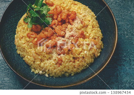 risotto with shrimp, in a bowl, on a textured surface, with a side dish of fresh coriander, homemade, no people, risotto with shrimp, in a bowl, on a textured surface, with a side dish of fresh coriander, homemade, no people, 138967434