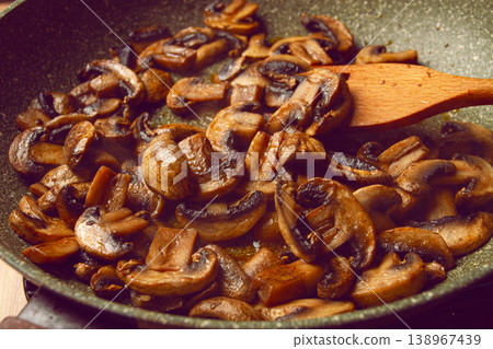 fried mushrooms in a frying pan, with a wooden fork, homemade, no people, fried mushrooms in a frying pan, with a wooden fork, homemade, no people, 138967439