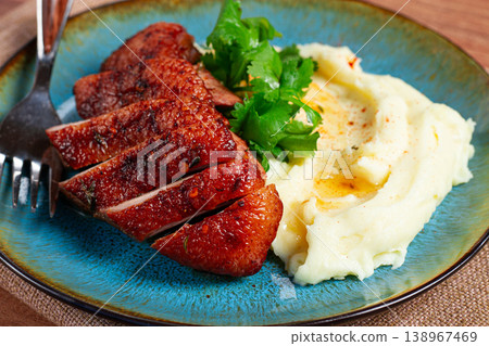 roast duck breast, sliced with mashed potatoes, on a plate,close-up, no people, roast duck breast, sliced with mashed potatoes, on a plate,close-up, no people, 138967469