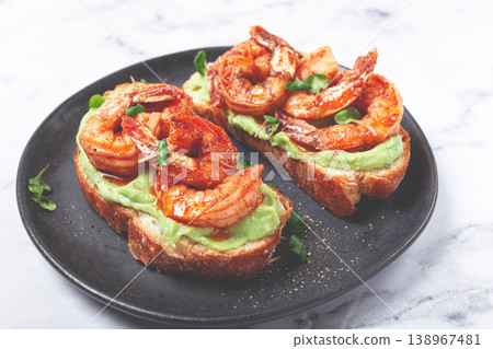 sandwiches with avocado and caramelized shrimp, micro-greens, breakfast, on a plate, top view, homemade, no people, 138967481