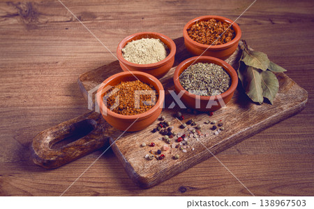 Georgian spices, in ceramic bowls, assortment, set of spices, utsho, adjika, Svan salt, ground coriander, top view, no people, Georgian spices, in ceramic bowls, assortment, set of spices, utsho, adjika, Svan salt, ground coriander, top view, no people, 138967503