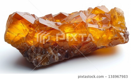 Isolated amber crystal piece on white background with translucent glow Isolated amber crystal piece on white background with translucent glow 138967983