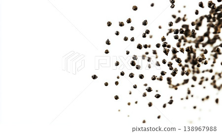 Black peppercorns flying isolated on a white background Black peppercorns flying isolated on a white background 138967988