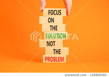 Problem and solution symbol. Concept words Focus on the solution not the problem on beautiful wooden blocks. Beautiful orange paper background. Business problem and solution concept. Copy space. Problem and solution symbol. Concept words Focus on the solution not the problem on beautiful wooden blocks. Beautiful orange paper background. Business problem and solution concept. Copy space. 138968489