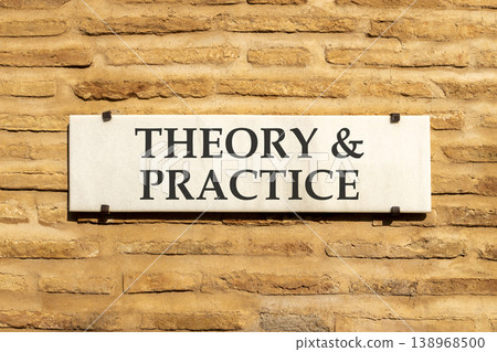 Theory and practice symbol. Concept words Theory and practice on beautiful big white sign plate. Beautiful old brown brick wall background. Business theory and practice concept. Copy space. 138968500