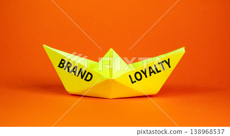 Brand loyalty words symbol. Concept words Brand loyalty on beautiful yellow paper boat. Beautiful orange background. Business and Brand loyalty words concept. Copy space. Brand loyalty words symbol. Concept words Brand loyalty on beautiful yellow paper boat. Beautiful orange background. Business and Brand loyalty words concept. Copy space. 138968537