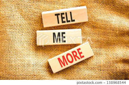 Tell me more words symbol. Concept words Tell me more on beautiful wooden blocks. Beautiful canvas background. Business and tell me more concept. Copy space. 138968544