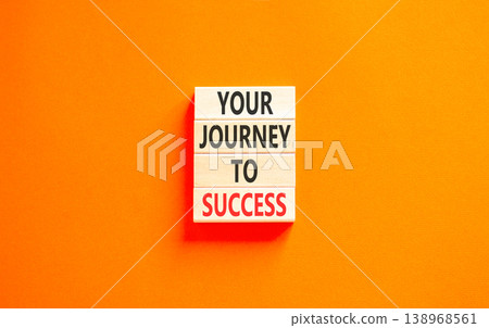 Your journey to success words symbol. Concept words Your journey to success on beautiful wooden blocks. Beautiful orange background. Business motivational your journey to success concept. Copy space. 138968561
