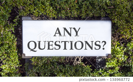 Any questions symbol. Concept words Any questions on beautiful big white sign plate. Beautiful green garden background. Business and Any questions Q and A concept, copy space. Any questions symbol. Concept words Any questions on beautiful big white sign plate. Beautiful green garden background. Business and Any questions Q and A concept, copy space. 138968772