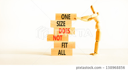 One size does not fit all symbol. Concept words One size does not fit all on wooden stick. Beautiful white background. Businessman model. One size does not fit all business concept. Copy space. One size does not fit all symbol. Concept words One size does not fit all on wooden stick. Beautiful white background. Businessman model. One size does not fit all business concept. Copy space. 138968856