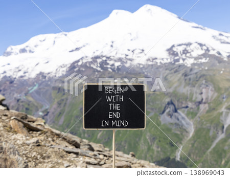 Begin with the end in mind symbol. Concept words Begin with the end in mind on beautiful black blackboard. Beautiful mountain Elbrus background. Business begin with the end in mind concept. Copy space Begin with the end in mind symbol. Concept words Begin with the end in mind on beautiful black blackboard. Beautiful mountain Elbrus background. Business begin with the end in mind concept. Copy space 138969043
