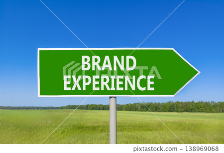 Brand experience symbol. Concept words Brand experience on beautiful green road sign. Beautiful blue sky green grass field background. Business branding and brand experience concept. Copy space. Brand experience symbol. Concept words Brand experience on beautiful green road sign. Beautiful blue sky green grass field background. Business branding and brand experience concept. Copy space. 138969068