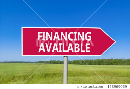 Financing available symbol. Concept words Financing available on beautiful red road sign. Beautiful blue sky green grass field background. Business financing available concept. Copy space. Financing available symbol. Concept words Financing available on beautiful red road sign. Beautiful blue sky green grass field background. Business financing available concept. Copy space. 138969069