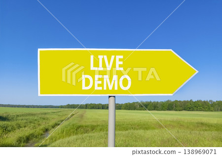 Live demo symbol. Concept words Live demo on beautiful yellow road sign. Beautiful blue sky green grass field background. Copy space. Business and live demo concept. Live demo symbol. Concept words Live demo on beautiful yellow road sign. Beautiful blue sky green grass field background. Copy space. Business and live demo concept. 138969071