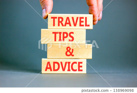 Travel tips and advice words symbol. Concept words Travel tips and advice on beautiful wooden blocks. Beautiful grey background. Business lifestyle travel tips and advice concept. Copy space. Travel tips and advice words symbol. Concept words Travel tips and advice on beautiful wooden blocks. Beautiful grey background. Business lifestyle travel tips and advice concept. Copy space. 138969098