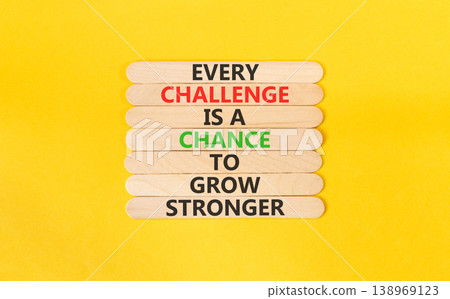 Challenge word symbol. Concept words Every challenge is a chance to grow stronger on beautiful wooden sticks. Beautiful yellow paper background. Business challenge is opportunity concept. Copy space. 138969123
