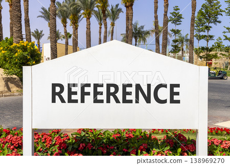 References or reference symbol. Concept word Reference on beautiful big white road sign. Beautiful blue sky and palm trees background. Business references or reference concept. Copy space. 138969270