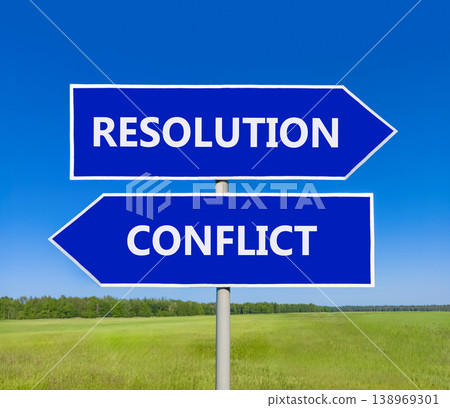 Resolution and conflict symbol. Concept words Resolution and Conflict on beautiful blue road sign. Beautiful blue sky green grass background. Social resolution instead conflict concept. Copy space. Resolution and conflict symbol. Concept words Resolution and Conflict on beautiful blue road sign. Beautiful blue sky green grass background. Social resolution instead conflict concept. Copy space. 138969301