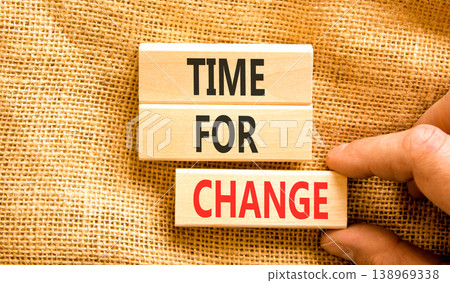 Time for change symbol. Concept words Time for change on beautiful wooden blocks. Beautiful canvas background. Businessman hand. Business and time for change concept. Copy space. Time for change symbol. Concept words Time for change on beautiful wooden blocks. Beautiful canvas background. Businessman hand. Business and time for change concept. Copy space. 138969338