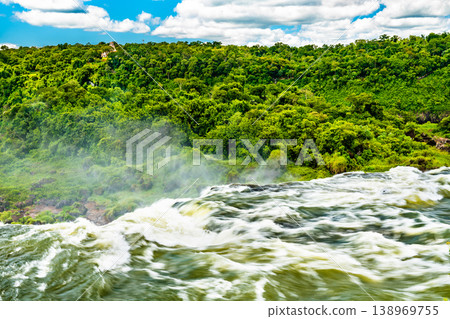 Iguazu Falls in a tropical rainforest in Argentina Iguazu Falls in a tropical rainforest in Argentina 138969755
