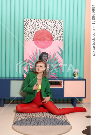 Energetic fashion shoot in lively retro studio environment Energetic fashion shoot in lively retro studio environment 138969994
