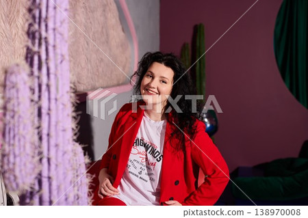 Contented woman wearing crimson offers nurturing and friendly atmosphere Contented woman wearing crimson offers nurturing and friendly atmosphere 138970008