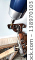 Cordless screwdriver for attaching a hinge to a furniture panel 138970103