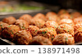 Cooked meatballs serving on a warm buffet tray 138971498