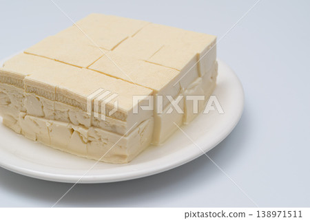 Tofu on a white plate Tofu on a white plate 138971511