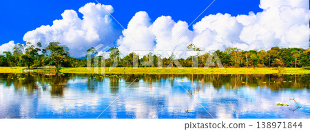 Composite image of cumulonimbus clouds over the remote Amazon River. Composite image of cumulonimbus clouds over the remote Amazon River. 138971844