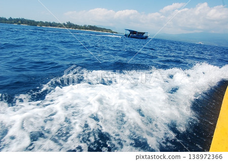 Boat sailing in sea at West Nusa Tenggara, Indonesia Boat sailing in sea at West Nusa Tenggara, Indonesia 138972366