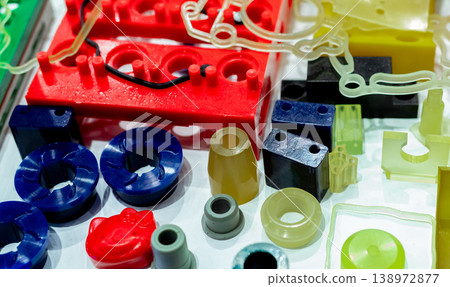 Engineering plastics. Plastic material used in manufacturing industry. Global engineering plastic market concept. Polyurethane and abs plastic parts materials. Plastic injection machine products. 138972877